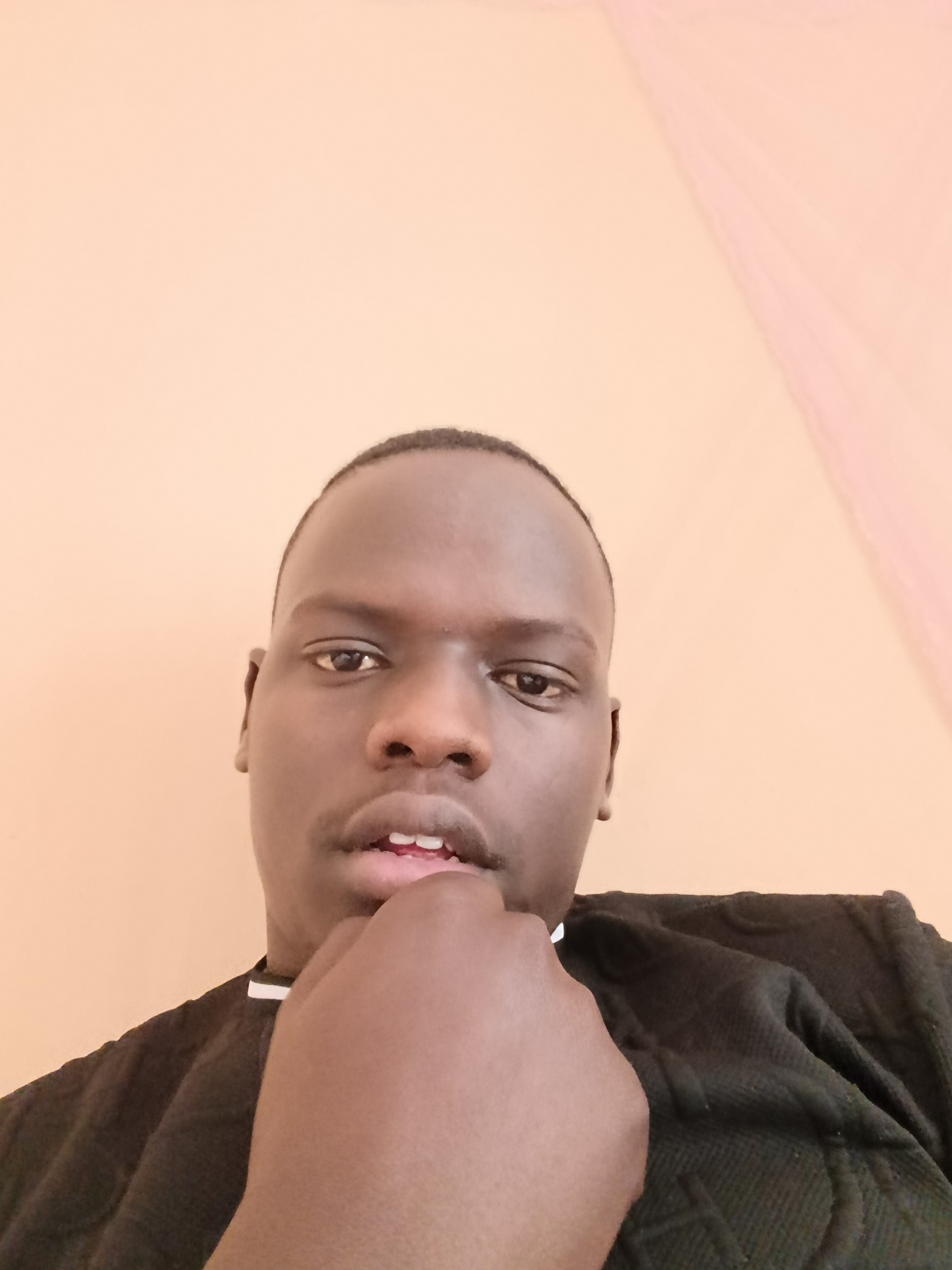ELKANA KIMUTAI SANG